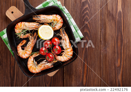 Grilled shrimps on frying pan Grilled shrimps on frying pan 22492176