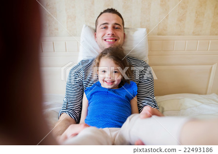 Father having fun with his cute little daughter Father having fun with his cute little daughter 22493186