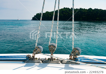 Small winch with rope on the deck of luxury yacht Small winch with rope on the deck of luxury yacht 22493278