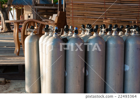 Line of scuba diving air tanks, selective focus Line of scuba diving air tanks, selective focus 22493364