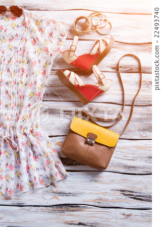 Blouse, wedge sandals and bracelets. Blouse, wedge sandals and bracelets. 22493740