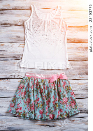 Floral skirt and tank top. Floral skirt and tank top. 22493776