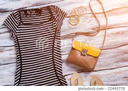 Striped black dress and sunglasses. Striped black dress and sunglasses. 22493778