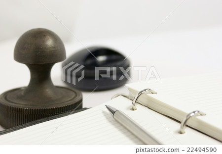 notebook and a stamp notebook and a stamp 22494590