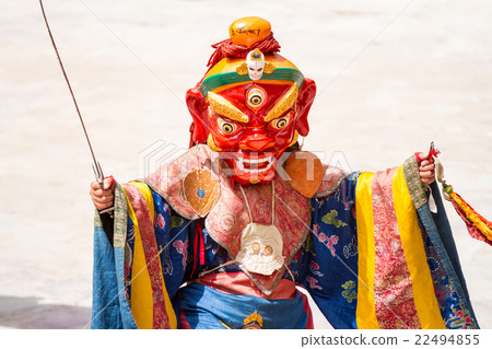 Monk performs a masked dance of Tibetan Buddhism Monk performs a masked dance of Tibetan Buddhism 22494855