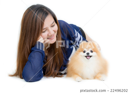 Beautiful Asian girl hugging a Pomeranian dog Beautiful Asian girl hugging a Pomeranian dog 22496202
