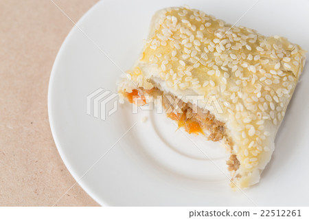 Pie stuffed special pork on white disk. 22512261