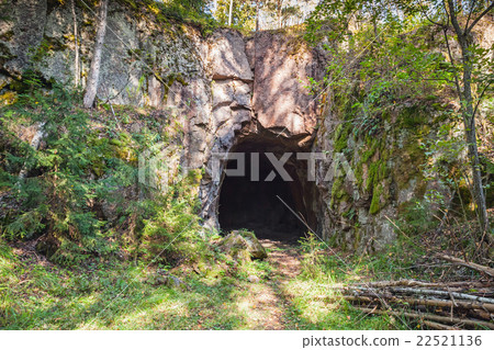 Entrance to dark cave in rock Entrance to dark cave in rock 22521136