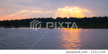 Sunset over Baltic Sea coast, sunbeams Sunset over Baltic Sea coast, sunbeams 22521144