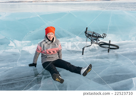 Girl on a bmx on ice. Girl on a bmx on ice. 22523710