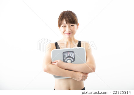 A woman with a scale 22525514