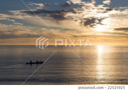 Kayaking at sunrise in Abel Tasman National Park Kayaking at sunrise in Abel Tasman National Park 22525925