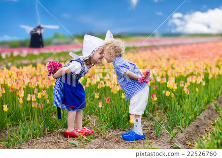 Dutch children in tulip field 22526760