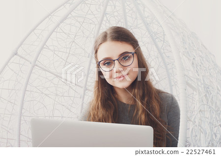 Stylish woman high key portrait with laptop. Stylish woman high key portrait with laptop. 22527461