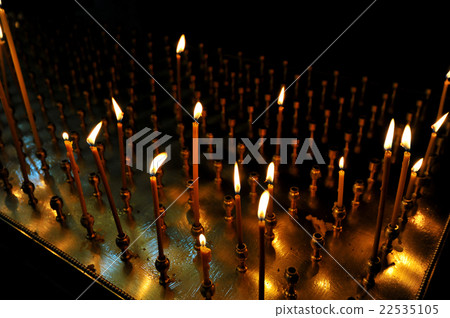 lit candle inside of an Orthodox Church 22535105