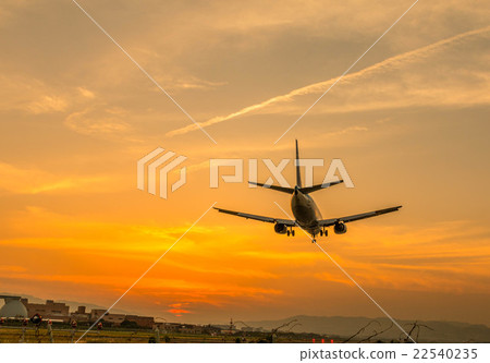 Airplane and sunset Airplane and sunset 22540235