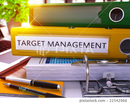 Target Management on Yellow Ring Binder. Blurred 22542988
