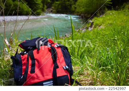 backpack over stream 22542997
