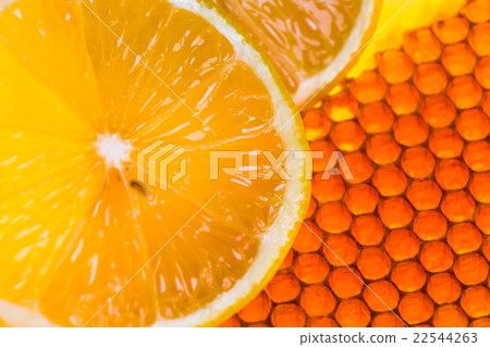 yellow honeycomb with fresh honey and lemon 22544263