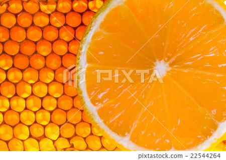 yellow honeycomb with fresh honey and lemon 22544264