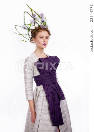 Studio portrait of beautiful model with crown Studio portrait of beautiful model with crown 22544778