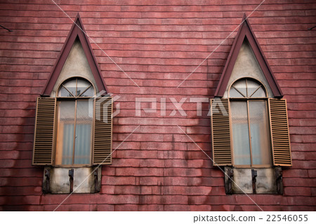Two gothic Windows on roof.  Wooden window 22546055