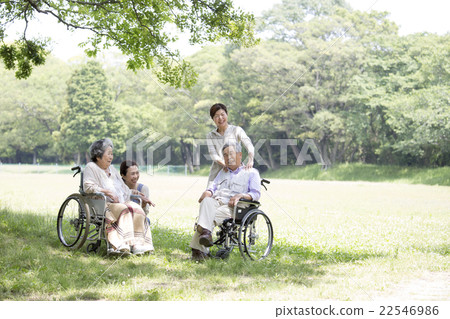 Seniors and helpers in wheelchairs 22546986