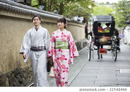 A couple taking a walk A couple taking a walk 22548466
