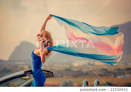 Young woman relaxing on the beach 22550431