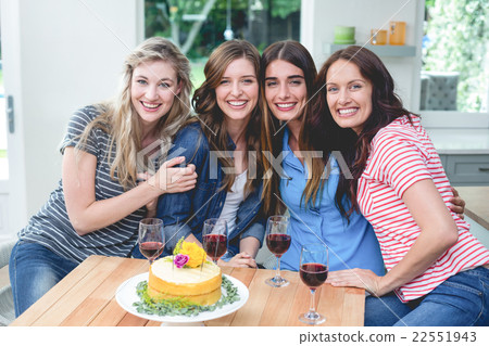 Portrait of beautiful women with birthday cake and glass of red Portrait of beautiful women with birthday cake and glass of red 22551943