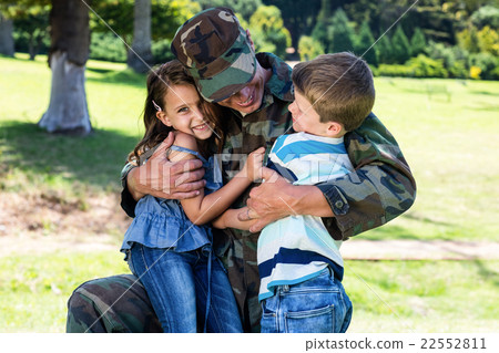 Happy soldier reunited with his son and daughter Happy soldier reunited with his son and daughter 22552811