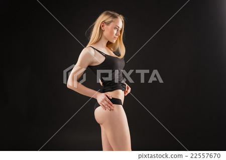 Young, slim, healthy and beautiful woman in white 22557670