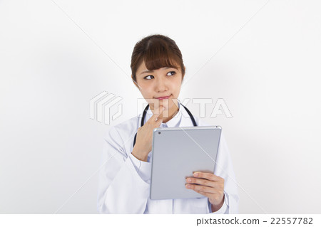 Female doctor nurse using tablet 22557782