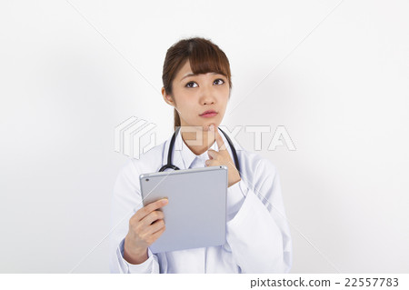 Female doctor nurse using tablet 22557783