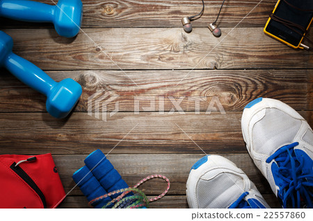 Sport stuff on wooden table, top view 22557860