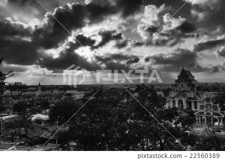 Light of rays shining through dark clouds 22560389