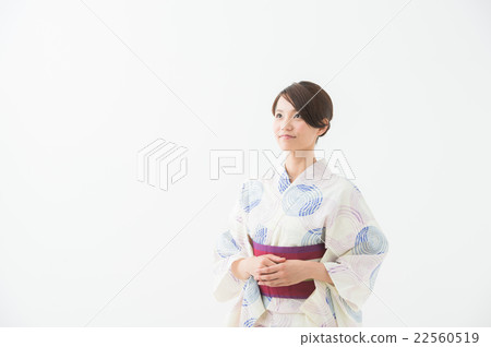 A woman in a yukata A woman in a yukata 22560519