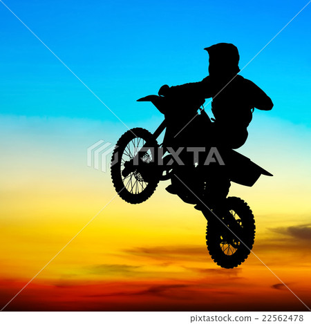 silhouette of motocross rider jump in the sky silhouette of motocross rider jump in the sky 22562478