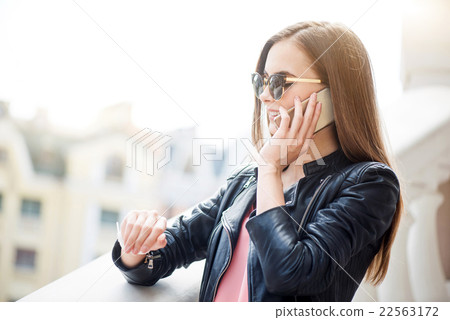 Modern young woman in a big city 22563172