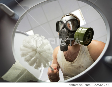 Man cleaning the toilet bowl 22564232