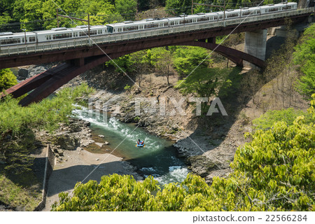 Sankyo Station 221 series train stopped at Hozukyo Station on the JR West San-in Line 22566284