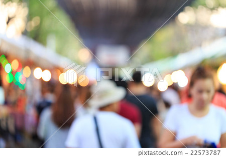 Blurred people at plaza market in the evening Blurred people at plaza market in the evening 22573787