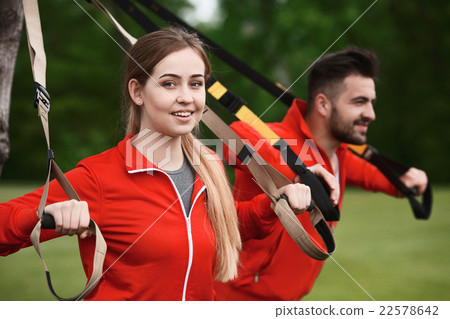 Sport man and woman training in park 22578642
