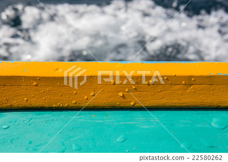 gunnel with wet drop water on blurred waving back gunnel with wet drop water on blurred waving back 22580262