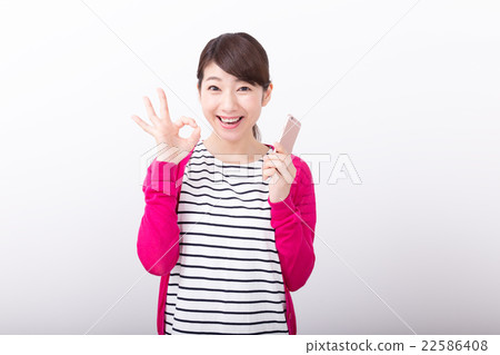 A young lady with a smartphone A young lady with a smartphone 22586408