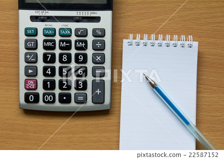 Calculator, notebook and pen Calculator, notebook and pen 22587152