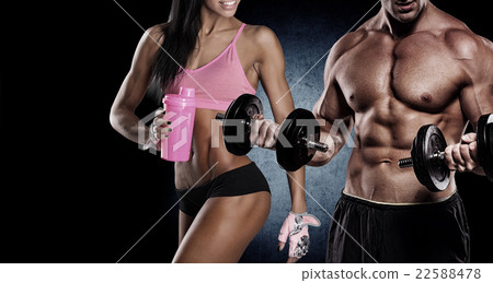 athletic couple poses for the camera athletic couple poses for the camera 22588478