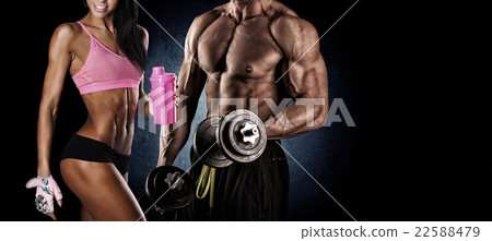 Man and woman isolated on a dark background Man and woman isolated on a dark background 22588479