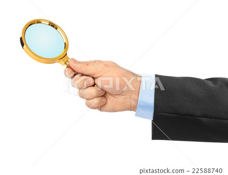 Magnifying glass in hand Magnifying glass in hand 22588740