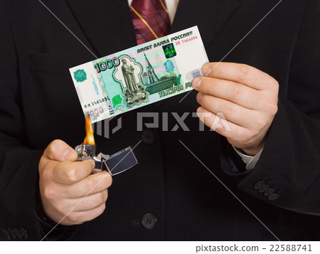 Hands and burnning russian money Hands and burnning russian money 22588741